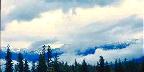 Cloud Sitting On Mountaintop