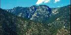 Liberty Bell Mountain Over Lake And Trees