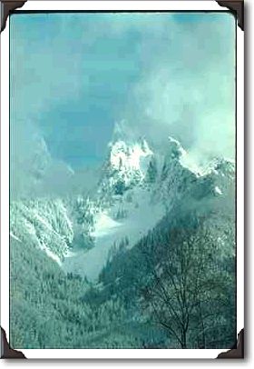Jagged Peak Shrouded With Clouds Jagged Peak Shrouded With Clouds