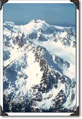 Looking Down On Snowy Peaks Looking Down On Snowy Peaks