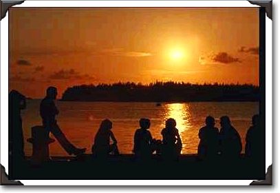 Watching sunset from Mallory Square, Key West, Florida Watching sunset from Mallory Square, Key West, Florida