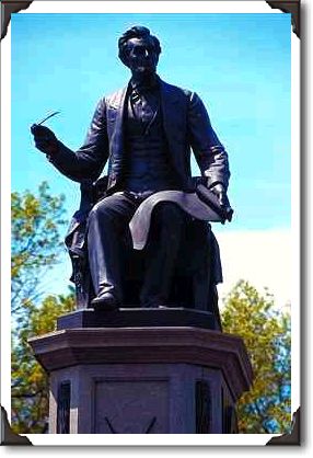 Abraham Lincoln signs an important document Abraham Lincoln signs an important document