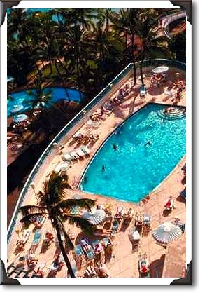 Rooftop condo pool overlooking Outrigger Hotel pool Rooftop condo pool overlooking Outrigger Hotel pool
