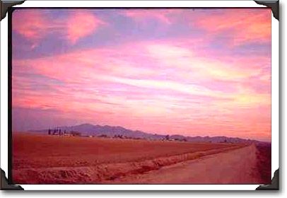 Skies glow over farmlands west of Phoenix Skies glow over farmlands west of Phoenix