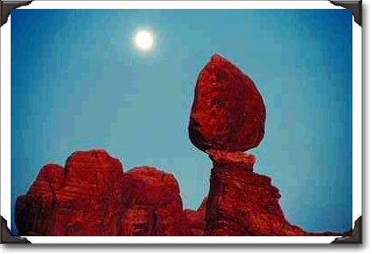 Moon over rock formations, Arches National Park, Utah Moon over rock formations, Arches National Park, Utah