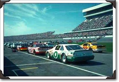 Cars await the start of a qualifying race at Daytona Cars await the start of a qualifying race at Daytona