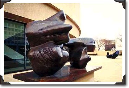 Bronze statue, two-piece reclining figure by Moore Bronze statue, two-piece reclining figure by Moore