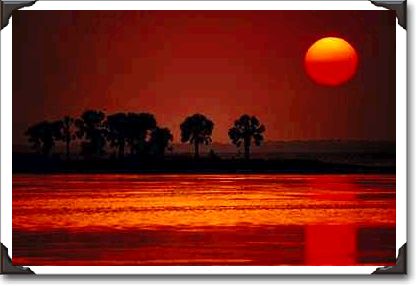 Sunset over tropical island, St. Joe, Florida Sunset over tropical island, St. Joe, Florida
