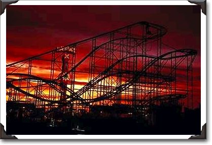 Roller coaster at dusk, Pima County Fair, Arizona Roller coaster at dusk, Pima County Fair, Arizona