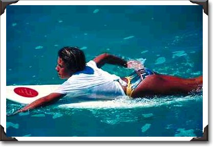 Surfer girl paddling, Hawaii Surfer girl paddling, Hawaii