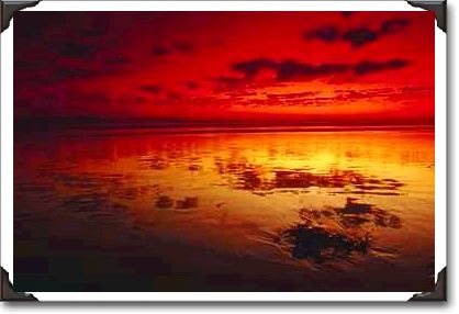 Summer sky reflections, low tide, Huntington Beach, California Summer sky reflections, low tide, Huntington Beach, California