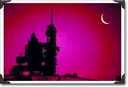 Sunset over launch pad with shuttle, Kennedy Space Center, Florida Sunset over launch pad with shuttle, Kennedy Space Center, Florida