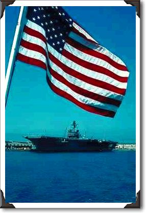 "USS Constellation" framed by flag, San Diego Naval Base, California "USS Constellation" framed by flag, San Diego Naval Base, California