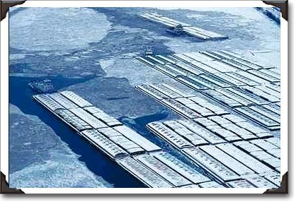 A grain barge slowly navigates the frozen Mississippi River A grain barge slowly navigates the frozen Mississippi River