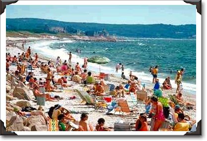 Summer beach goers, Monument Beach on Buzzard's Bay, Massachusetts Summer beach goers, Monument Beach on Buzzard's Bay, Massachusetts