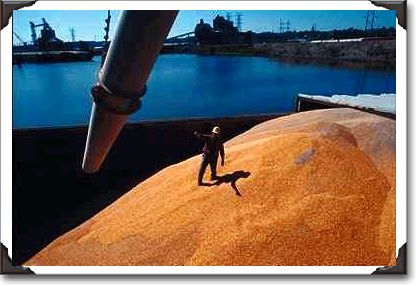 Barge being loaded with grain on Mississippi River in Dubuque, Iowa Barge being loaded with grain on Mississippi River in Dubuque, Iowa