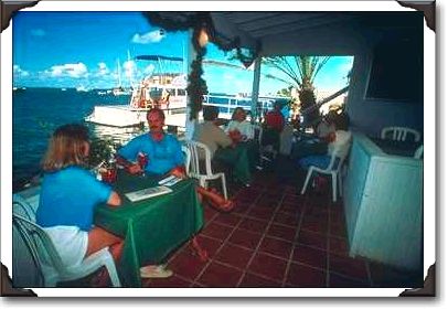 Dining at a harborside restaurant, Christiansted, St. Croix Dining at a harborside restaurant, Christiansted, St. Croix
