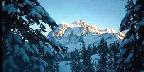 Shadowed Side Of Snowy Mountain
