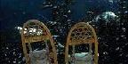 Snowshoes In Front Of Peaks