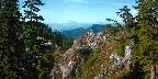 Mountains Behind Red Outcropping