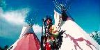 Apache warrior and teepees, Oklahoma