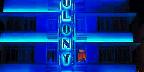 Electric blue neons, famed Colony Hotel