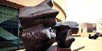 Bronze statue, two-piece reclining figure by Moore