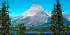 Morning reflections of Mount Wilbur in Swiftcurrent Lake, ...