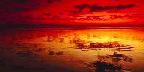 Summer sky reflections, low tide, Huntington Beach, California