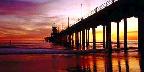 Low tide reflections at sundown, Huntington Beach pier, California